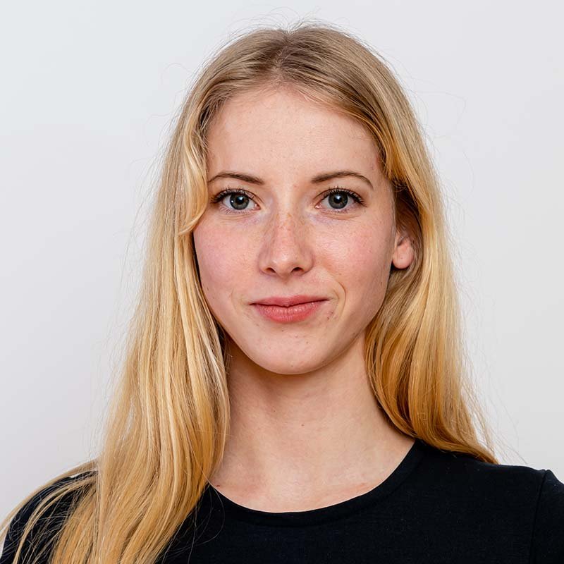 portrait-of-a-young-blonde-woman-isolated-on-a-whi-EZCC7RP.jpg