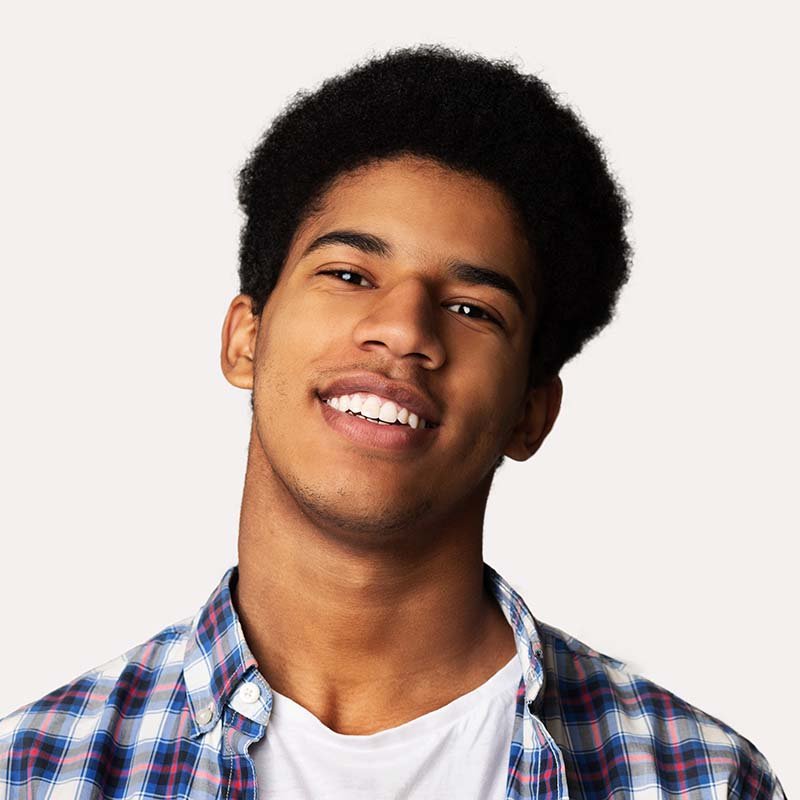 portrait-of-happy-young-african-guy-on-white-backg-HELQBXA.jpg